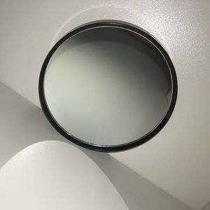 Magnifying suction mirror